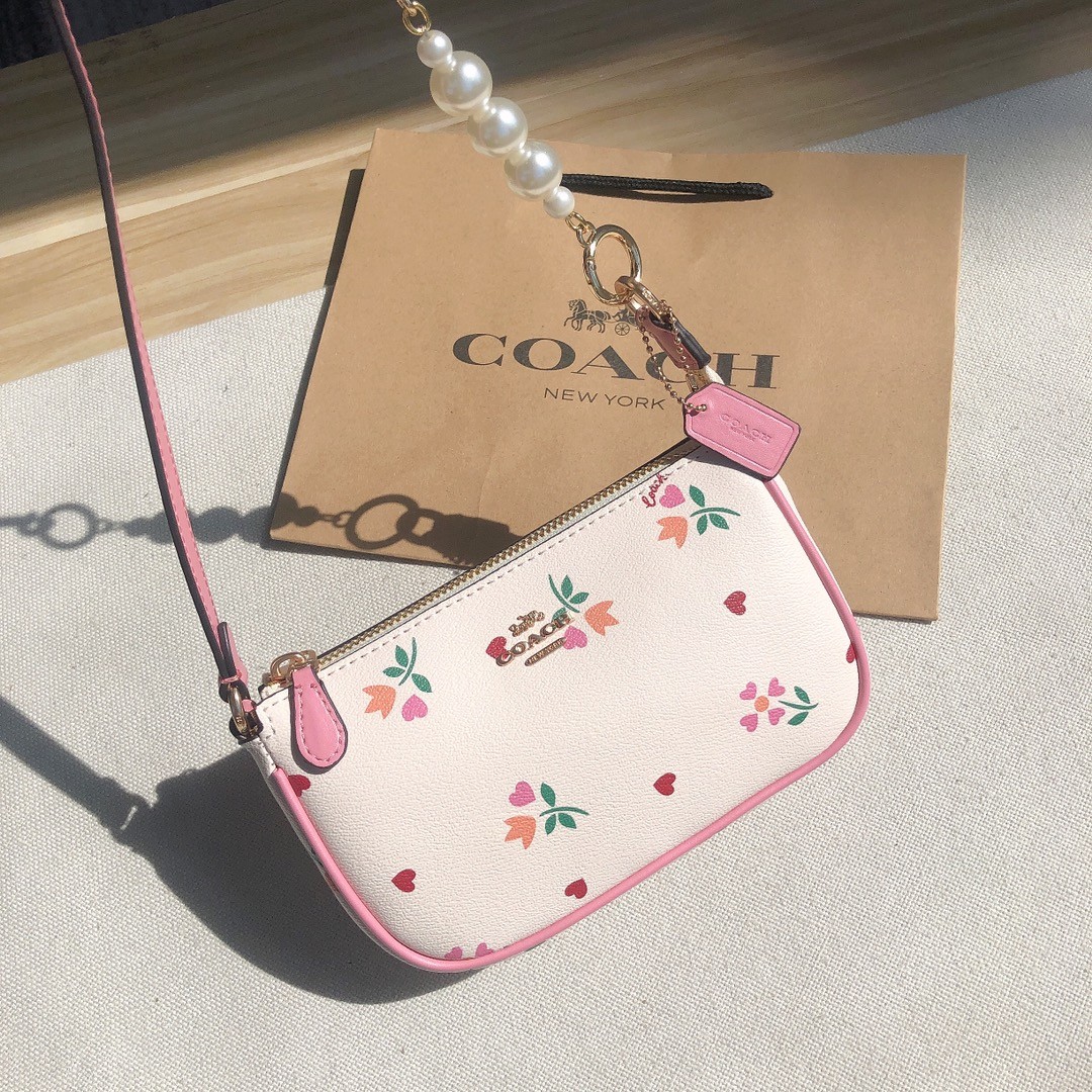 Coach pink floral purse best sale