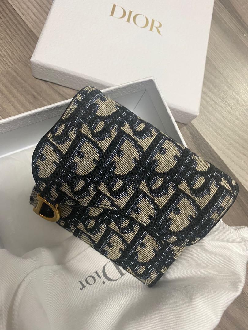 Dior saddle lotus wallet price 2025 singapore