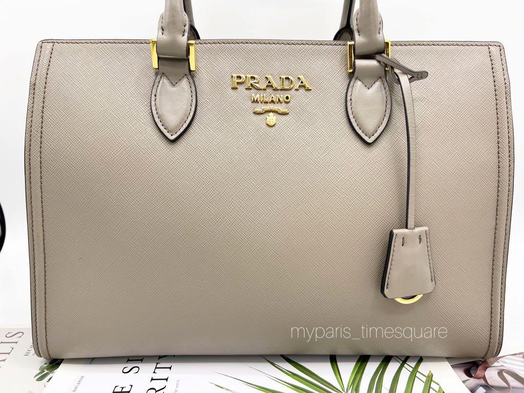 .. 1BA228 Argilla Grey Saffiano Lux Tote, Luxury, Bags & Wallets on  Carousell