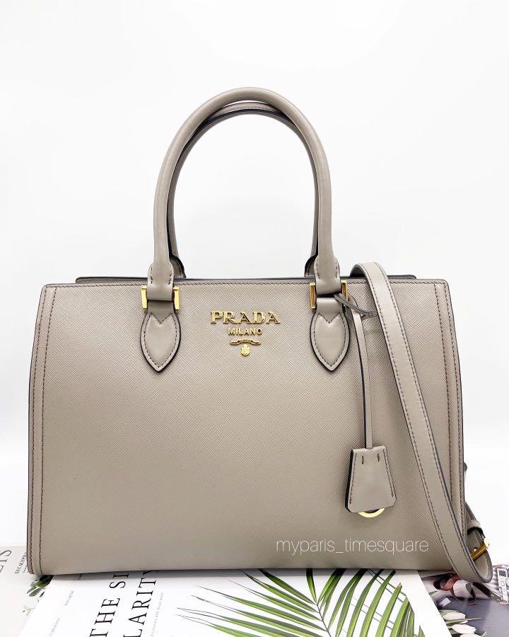 .. 1BA228 Argilla Grey Saffiano Lux Tote, Luxury, Bags & Wallets on  Carousell