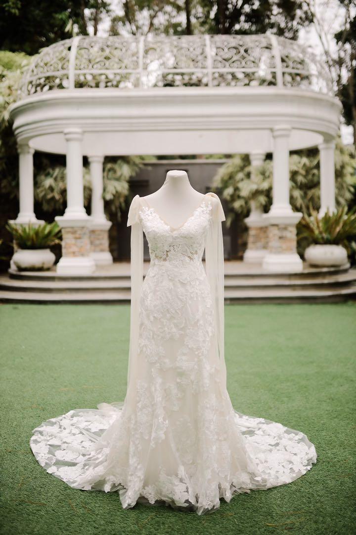 Preloved Modern Style Bridal Gown (Category: Evening dresses & gowns) located in Quezon City. Submitted by mummyajdc (Listing ID 1149143041, Image 3). Description: Pre-loved Wedding Gown For all soon-to-be brides! I am selling my sister’s wedding gown, worn last December 2021. Everything is still dashingly good as new. It’s already dry cleaned. This is a RTW (with additional detachable shoulder ribbons) dress from Ivory and White Bridal Store. :)