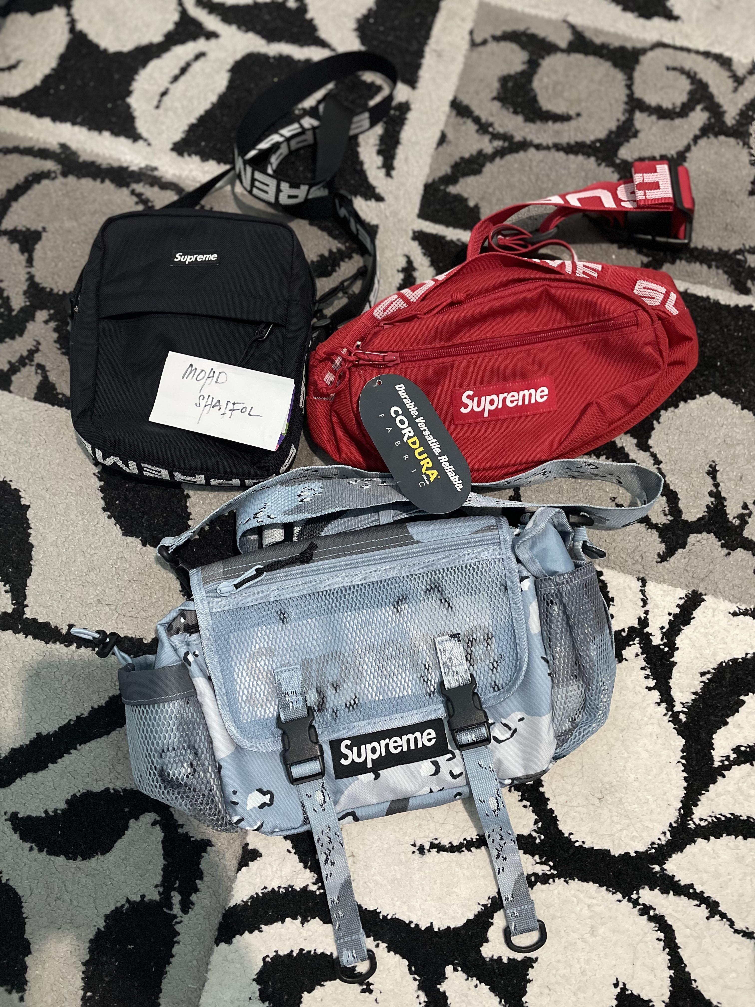 Supreme purse hotsell red