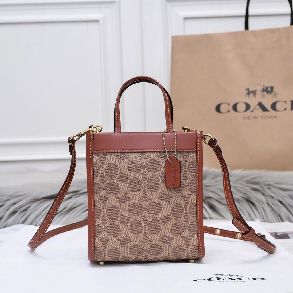 Coach Laptop Bag un Signature Canvas, Luxury, Bags & Wallets on Carousell