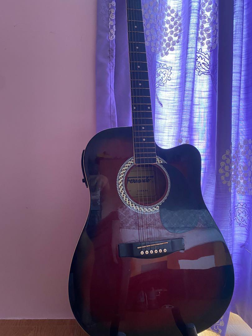 Fernando guitar (Category: Everything Else Others) located in Caloocan City. Submitted by araezekiel (Listing ID 1149272803, Image 2). Description: It comes with stand, a case and capo.