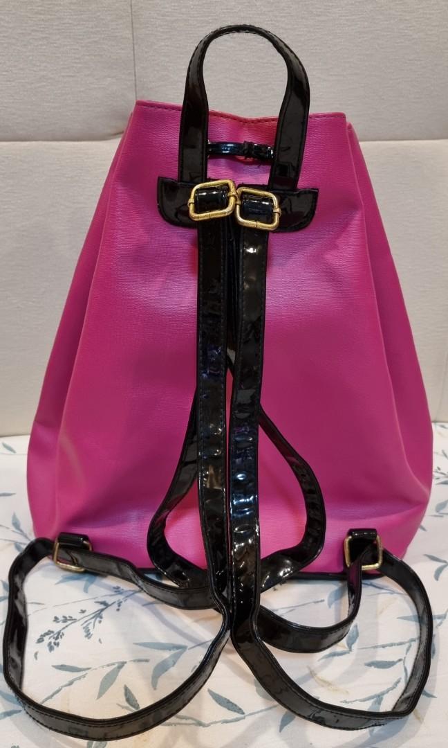 Juicy Couture Pink Drawstring Backpack (Category: Backpacks) located in Makati City. Submitted by eilener (Listing ID 1149397673, Image 2). Description: Material : Faux Leather Color : Hot Pink Type: Drawstring Bucket Backpack.