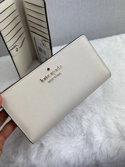 Kate Spade Staci Large Slim Bifold Wallet in Parchment, Luxury, Bags &  Wallets on Carousell