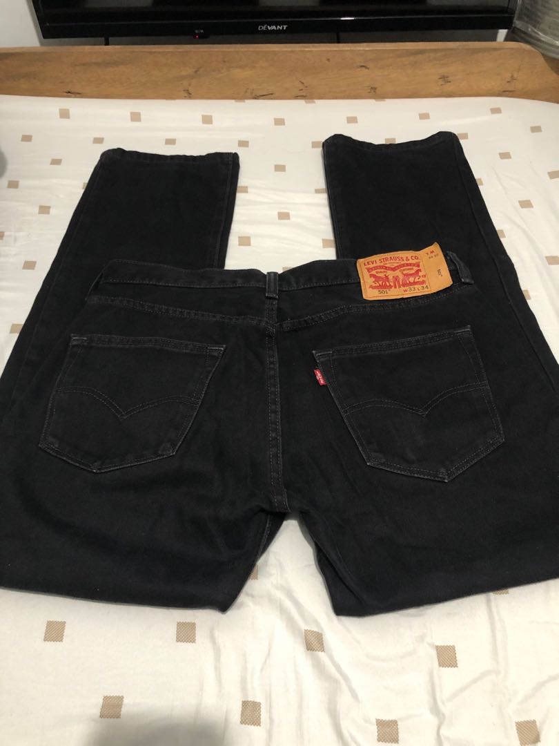 Levi's 501 Button Fly Black Denim Jeans For Him(W33-34 L34), Men's Fashion,  Bottoms, Jeans on Carousell