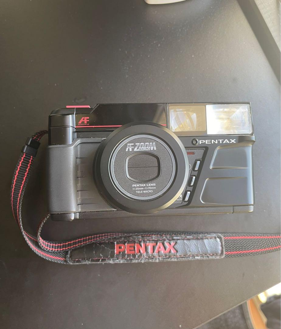 Lens 35-70 mm Tele-Macro Working Film Camera. Film Camera Pentax Pentax Zoom 70-S Point and Shot Camera Lens 35-70 mm Tele-Macro Working Film Camera. Film Camera Pentax Pentax Zoom 70-S Point and Shot Camera