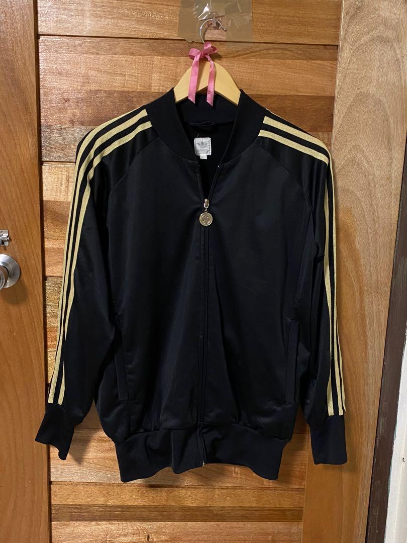 Gold stripe adidas jacket hotsell