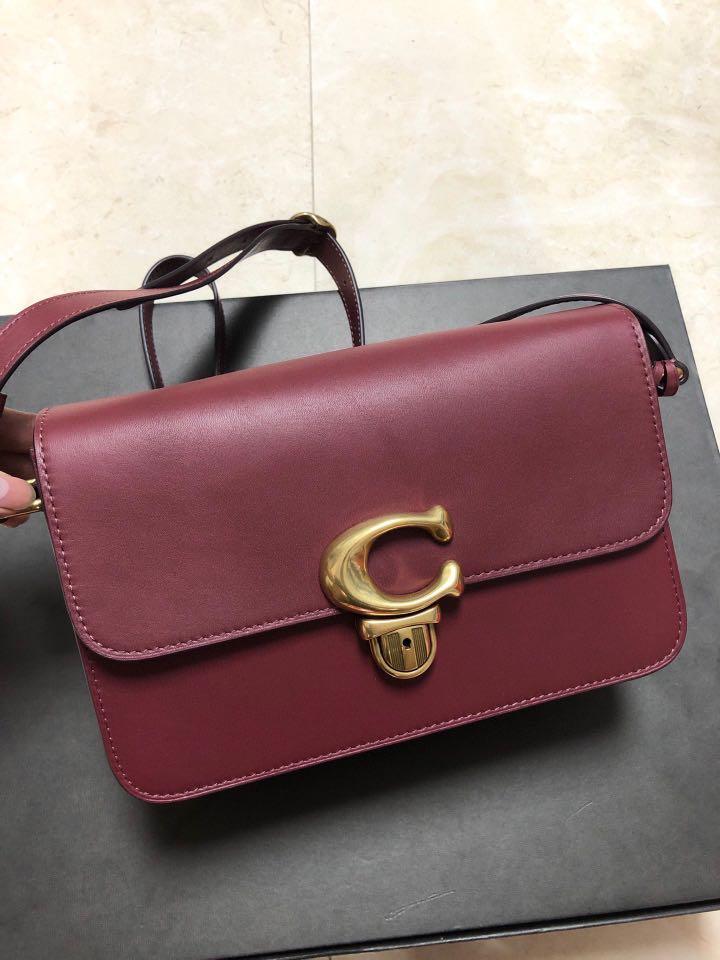 Coach wine colored bag top
