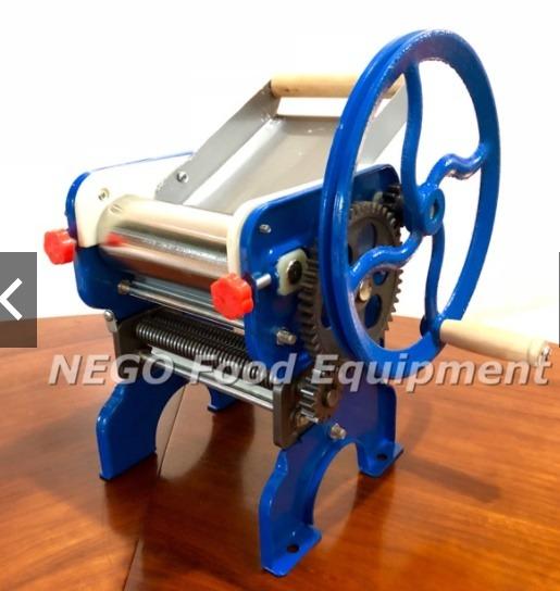 Heavy Duty Manual Noodle Cutter (Category: Fresh Produce) located in Las Pinas. Submitted by negofexpress (Listing ID 1149504428, Image 2). Description: Product Details 1) Brand new 2) Heavy duty 3) Made of metal structure, firm and durable 4) High quality roller and cutter 5) 2 Detachable Noodle Knife Design 6) Easy to operate 7) Cheapest in town Specifications 1) Blade diameter: 2-3mm 2) Dimension: 30*30*40cm 3) Weight: 10 kg Warranty 1) 3 Days
