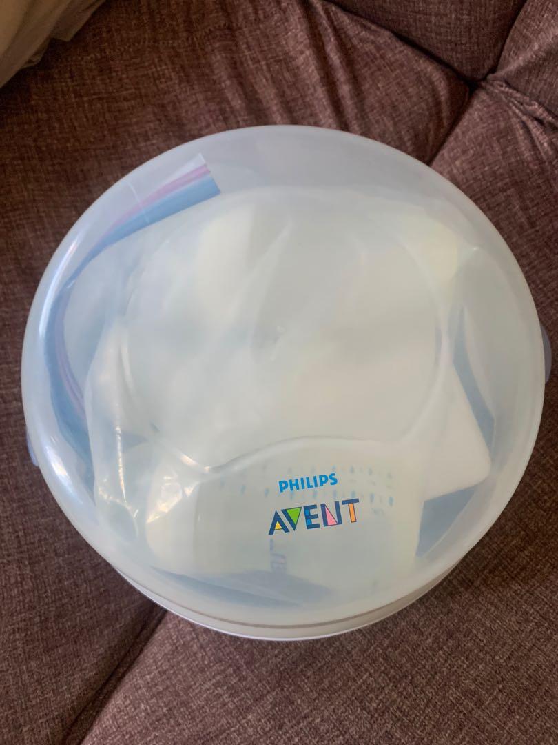 Philips Avent Microwave Steriliser (Category: Breastfeeding & Bottle Feeding) located in Manila. Submitted by my_handmedown (Listing ID 1149513723, Image 1). Description: Philips Avent SCF271/51 PP Microwave Steriliser Unused 9/10 No box *With free bottles in pic .