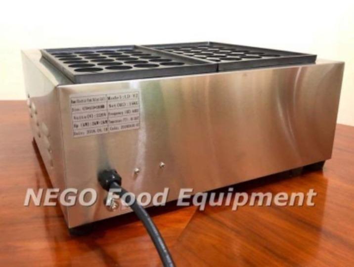 Takoyaki Maker Electric 56 Holes (Category: Bathroom & Kitchen Fixtures) located in Las Pinas. Submitted by negofexpress (Listing ID 1149490575, Image 1). Description: Product Details 1) Brand new with warranty 2) Heavy duty and for commercial use 3) High quality heating element 4) Certified CE approved 5) Fully stainless body 6) Cheapest in town Note: Plug not included for this machine as imported directly from the manufacturer. Specifications 1
