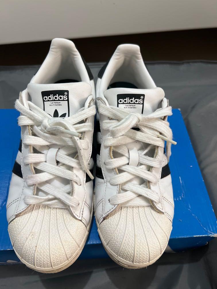 White shoes with 3 black stripes online