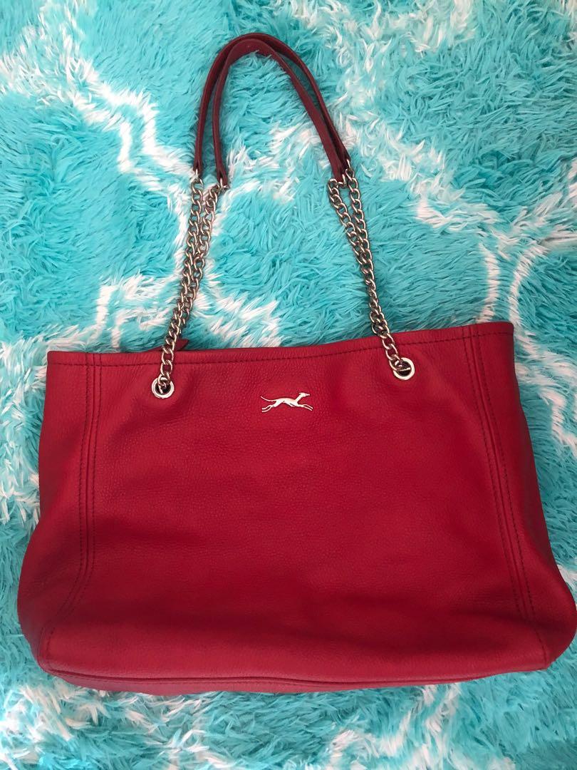 Bimba Y Lola Leather Tote Bag (Category: Tote Bags) located in Singapore. Submitted by jtl (Listing ID 1149677874, Image 1). Description: DETAILS: Base Length: 16 in Height: 12.5 in Width: 5 in .