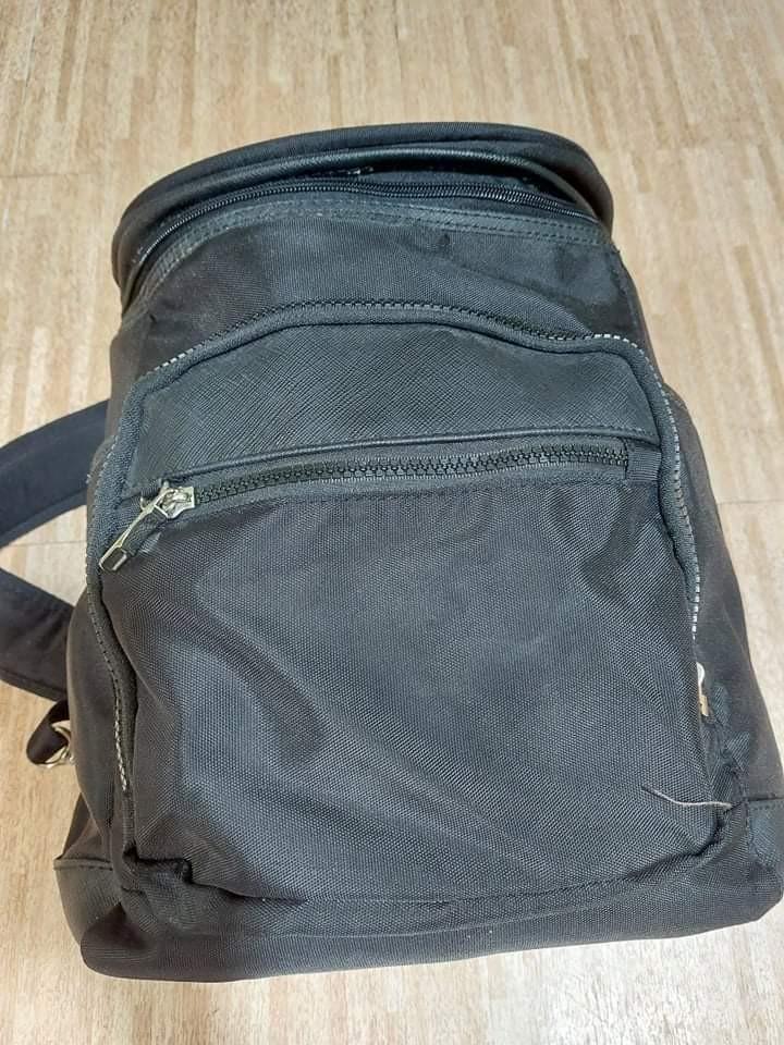 ELLE Fashion Backpack (Category: Backpacks) located in Antipolo. Submitted by kdens21 (Listing ID 1149670564, Image 3). Description: ELLE Fashionable Backpack Original price when bought: Php 1,300 Size: 14.5in x 12in; allowed as one piece carry-on baggage in airplanes -water resistant and interior padded -interior: 2 open pockets, 1 zipped pocket -exterior: one main bag zipper, 5 additional pockets (3 zipped pockets, 2 magnetic buttons) -if you w
