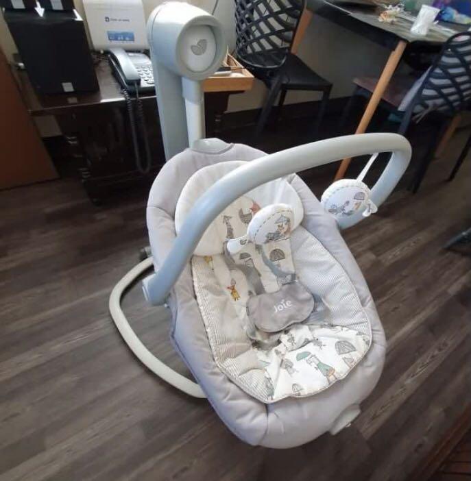 RUSH!! Joie Serina 2in1 Swing Rocker (Category: Other Kids Furniture) located in San Pedro. Submitted by iamvans01 (Listing ID 1149706102, Image 2). Description: Pm me for video. Rarely used Features Colour: In The Rain Suitable from birth to 13kg (approx. 6-9mths) Lift off swing seat doubles as a portable rocking seat Pivoting carry handle 2 way seat swings front to back or side to side 6 swing speeds 2 wheels and integrated handle 3 position re