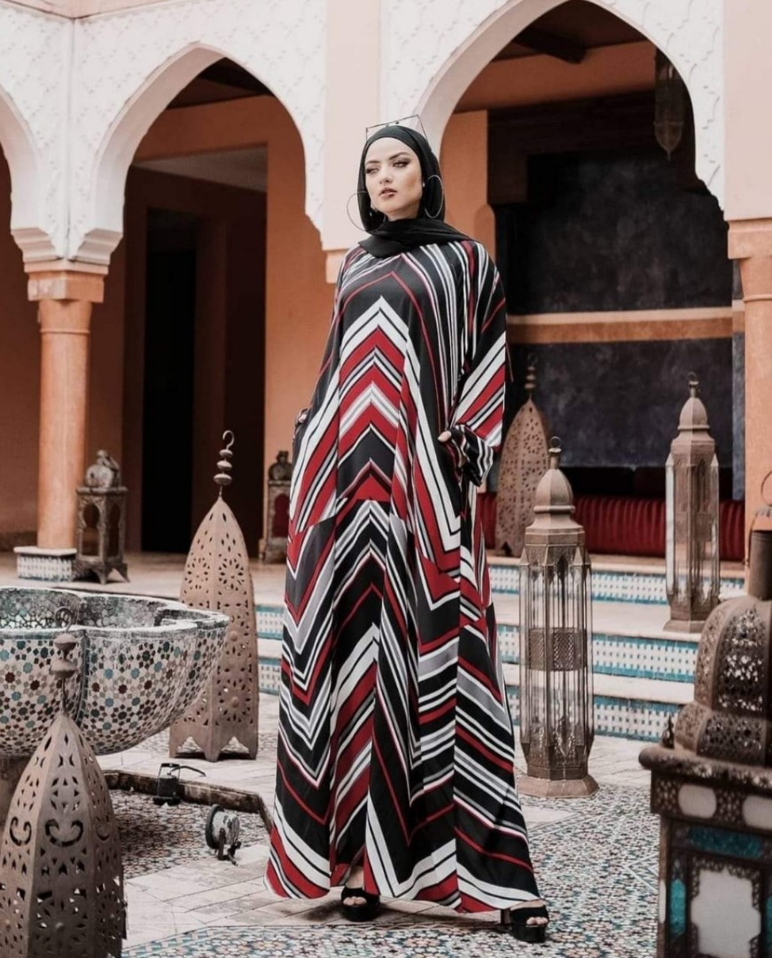white and black abaya