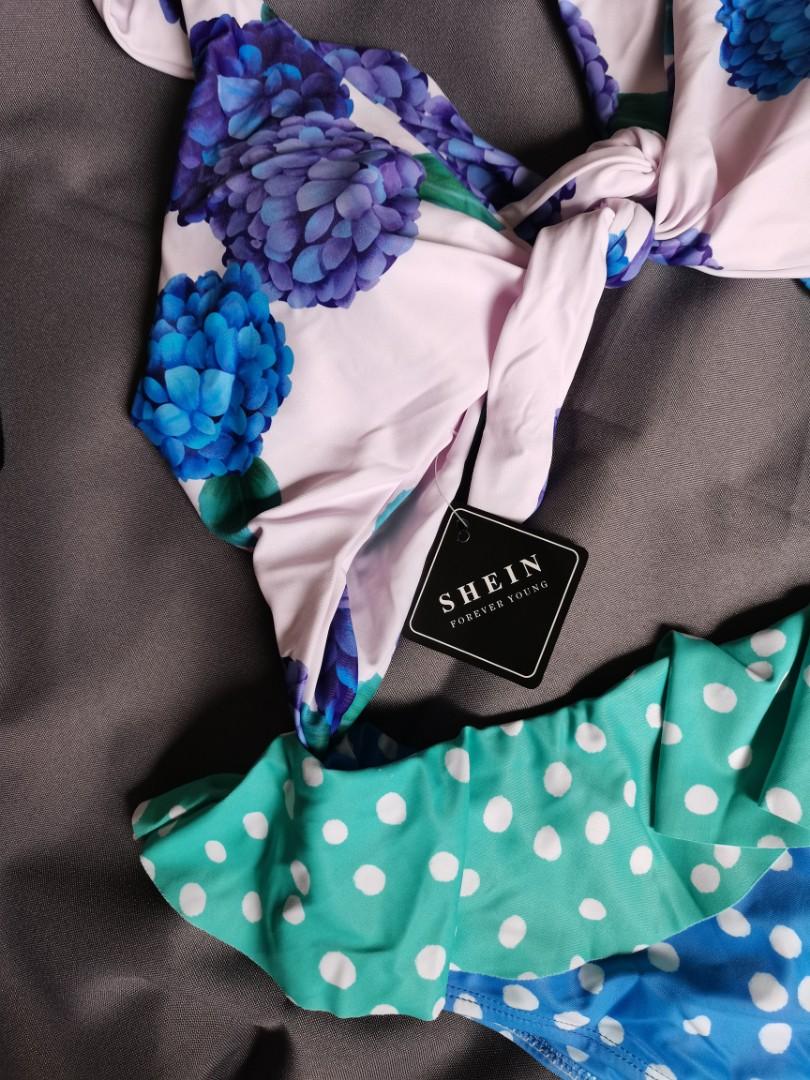 SHEIN Floral 1PC swimsuit (large) (Category: Bikinis & Swimsuits) located in Cavite. Submitted by belovedbyd (Listing ID 1149796215, Image 2). Description: Brandnew with tags and pouch Padded with hygienic tape fits up to semi XL Waist 15in to 17in Bust Adjustable * no when worn photo *.