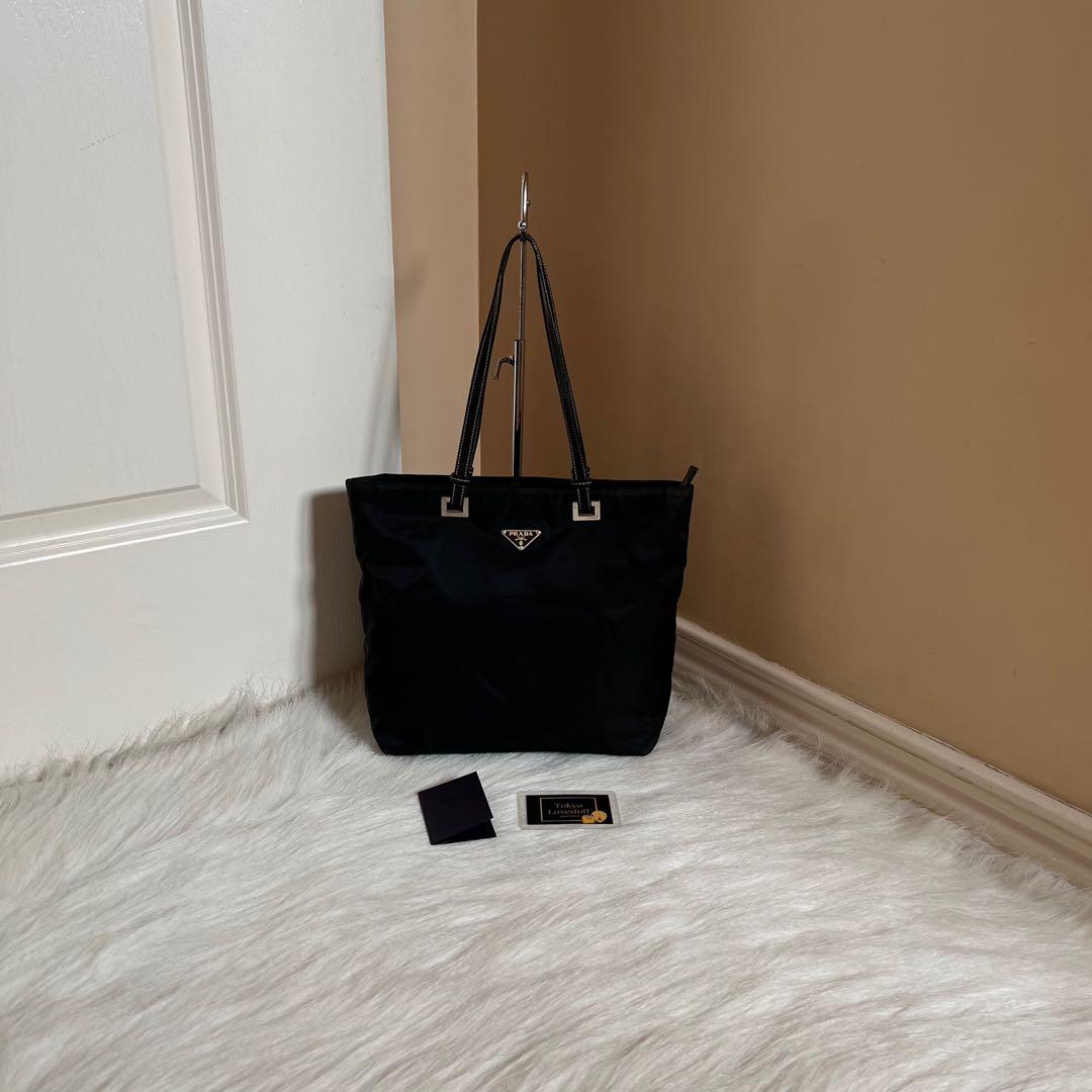 Prada nylon pochette in black, Luxury, Bags & Wallets on Carousell