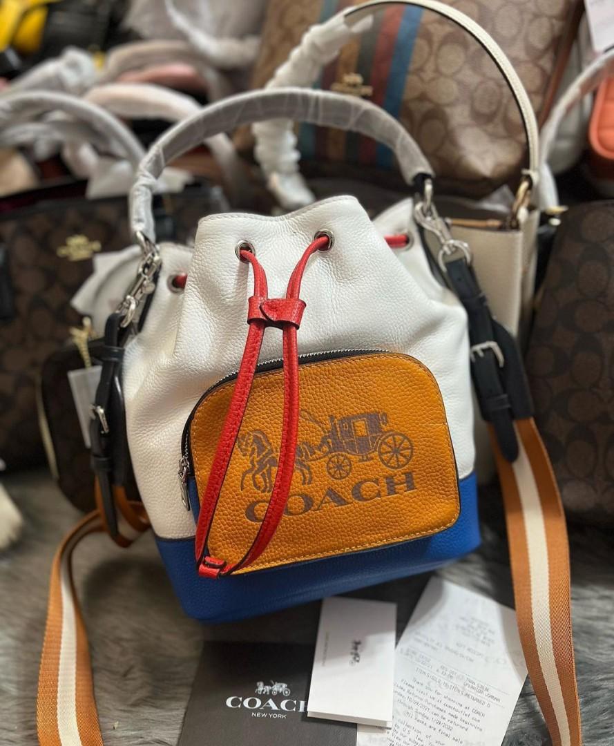 Coach jes drawstring bucket bag sales in colorblock with horse and carriage
