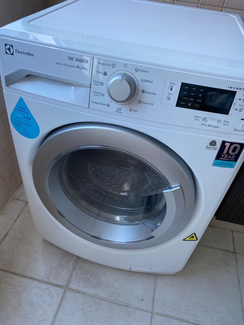 Electrolux Washer + dryer 8kg/6kg serial number EWW12842, TV & Home