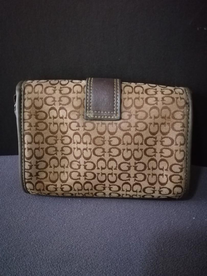Guess cosmetic pouch, Women's Fashion, Bags & Wallets on Carousell