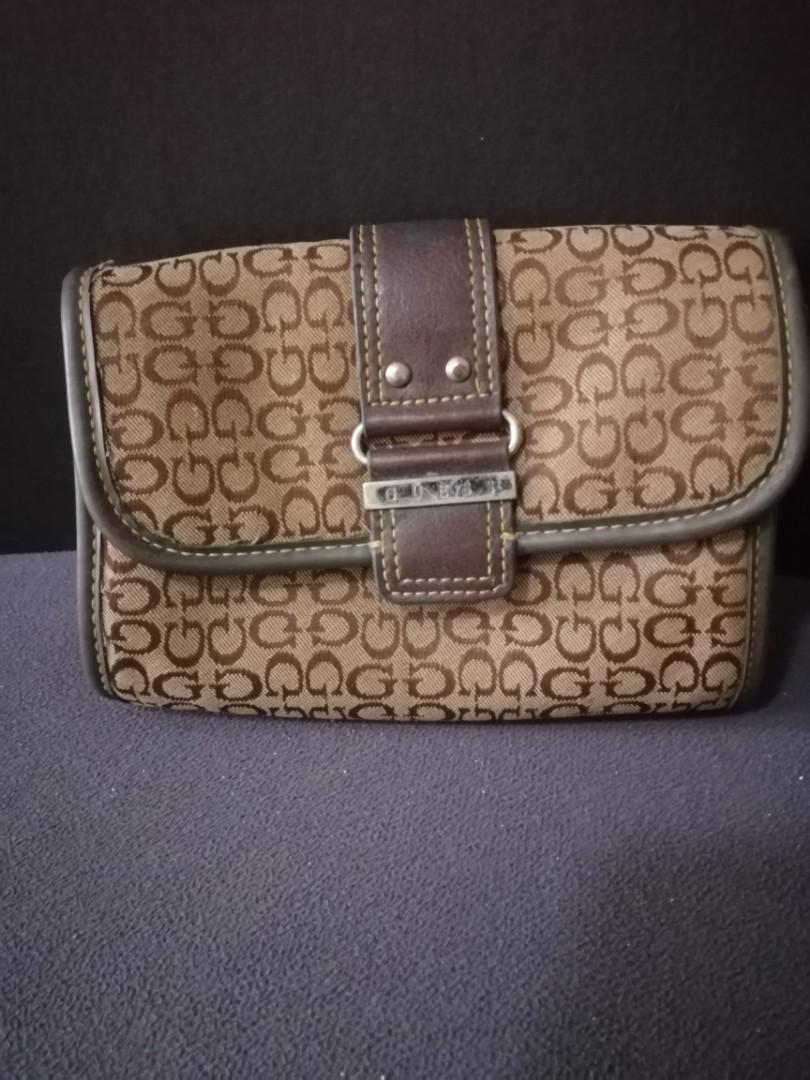 Guess cosmetic pouch, Women's Fashion, Bags & Wallets on Carousell