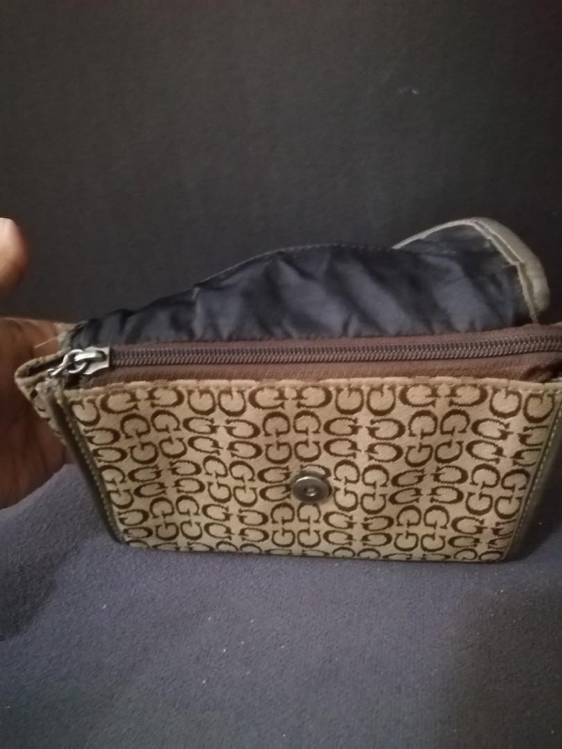 Guess cosmetic pouch, Women's Fashion, Bags & Wallets on Carousell