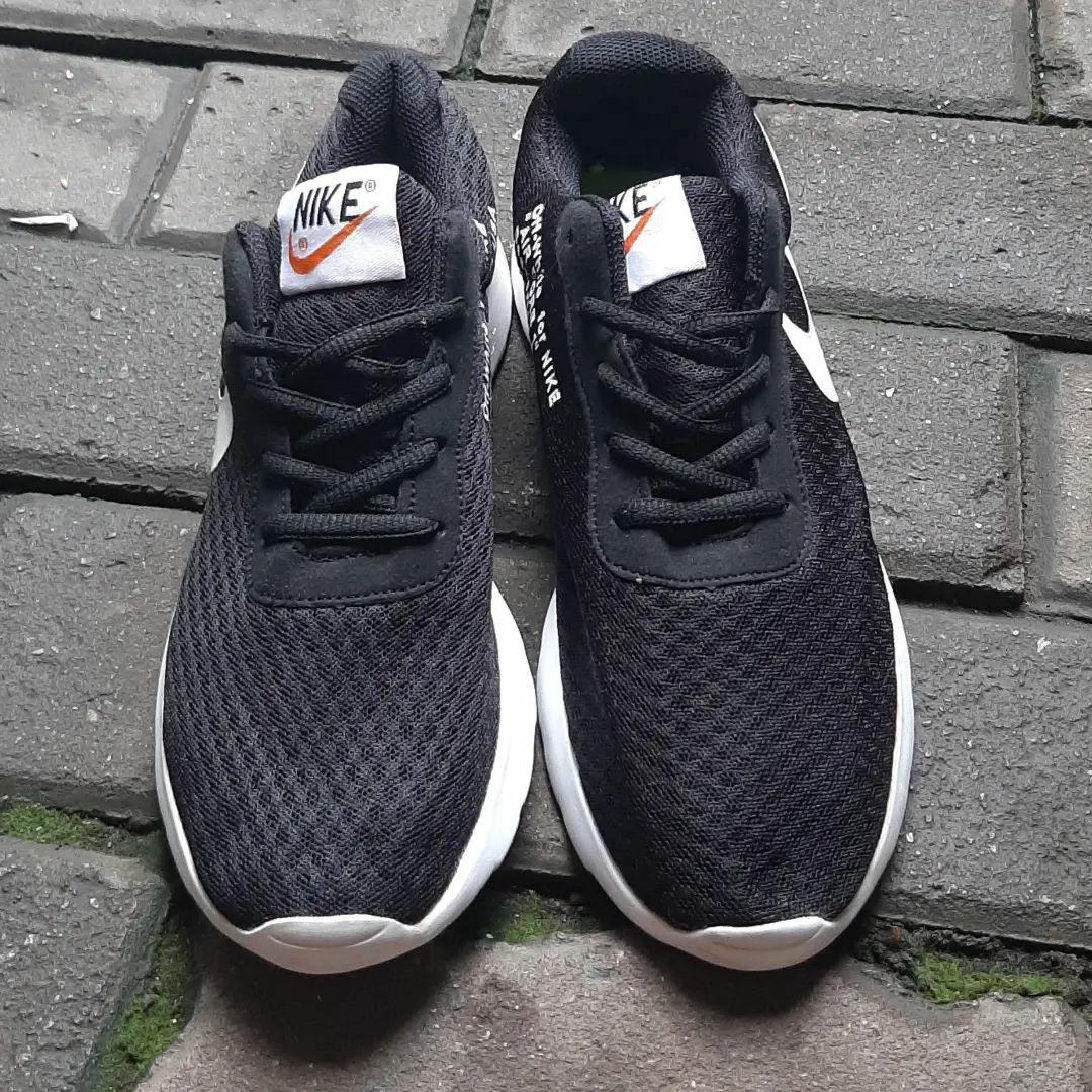 Nike tanjun top x off white