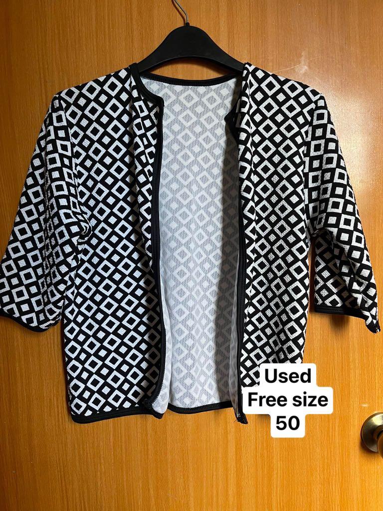 Cardigan black and white (Category: Others Tops) located in Taytay. Submitted by nuristef (Listing ID 1146686018, Image 1). Description: Preloved plus size clothes Shopee checkout available Price, size and condition of items are on pics Please manage your expectations. Some are used, some are never worn. You can ask for additional pics (when worn) before checking out MOP: BPI, BDO, GCASH MOD: GGX, Lalamove, Grab, Shopee (buyer will shoulder shipp