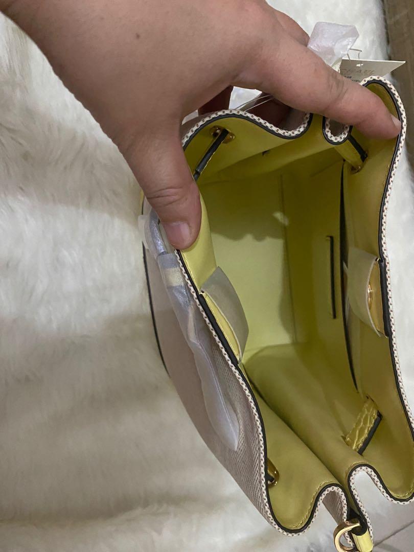 Mk emilia bucket (Category: Luxury Bags & Wallets) located in Pasig City. Submitted by jackie_ginger (Listing ID 1146721587, Image 3). Description: Onhand with tag and care card 💯 orig from US.