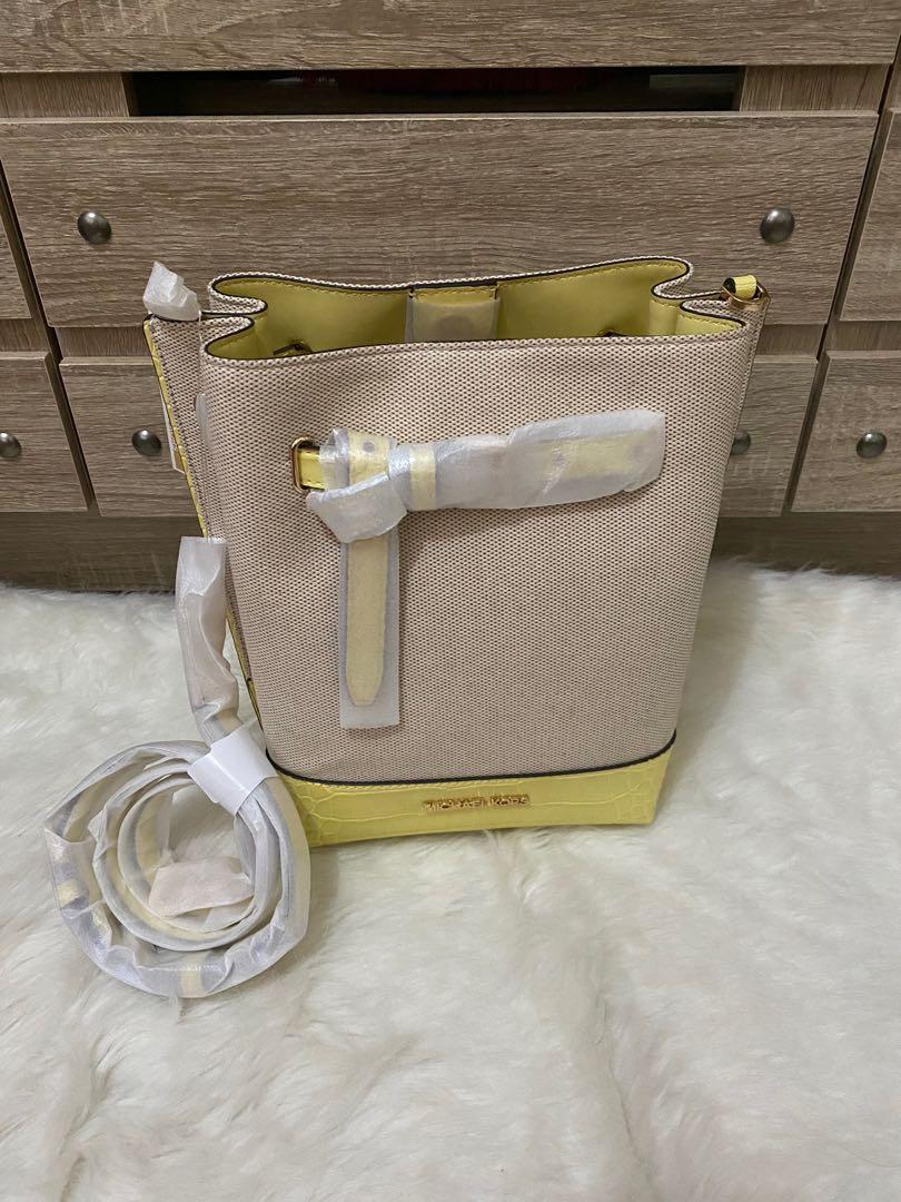Mk emilia bucket (Category: Luxury Bags & Wallets) located in Pasig City. Submitted by jackie_ginger (Listing ID 1146721587, Image 1). Description: Onhand with tag and care card 💯 orig from US.