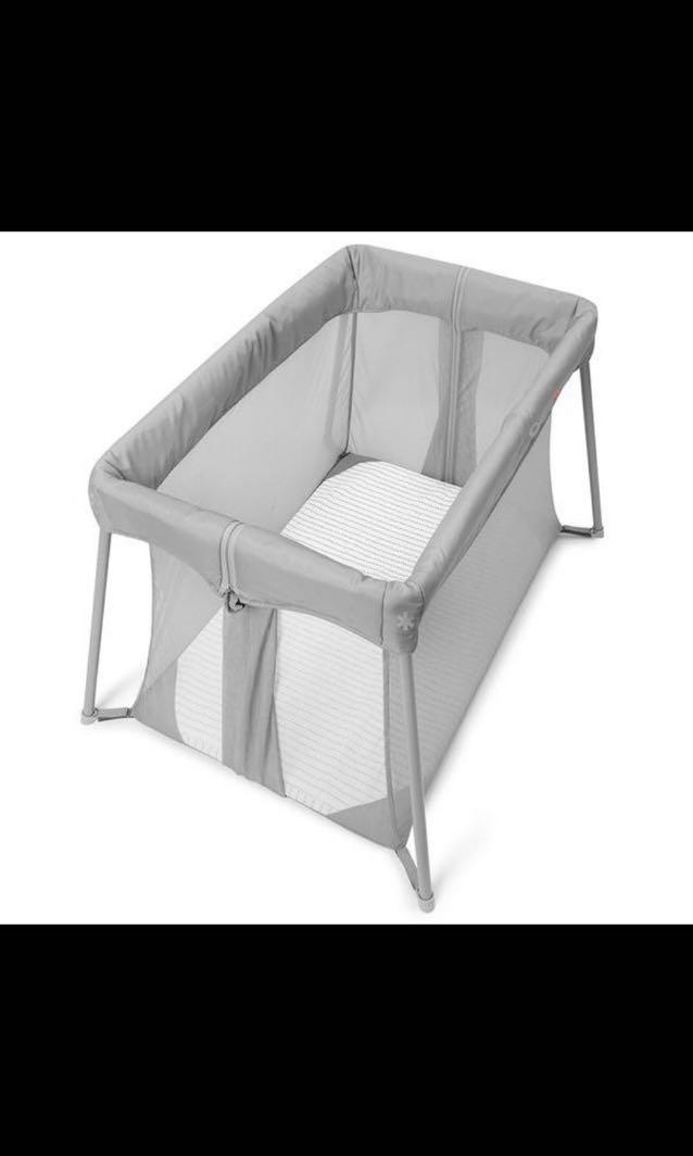 Play to night sale expanding travel crib