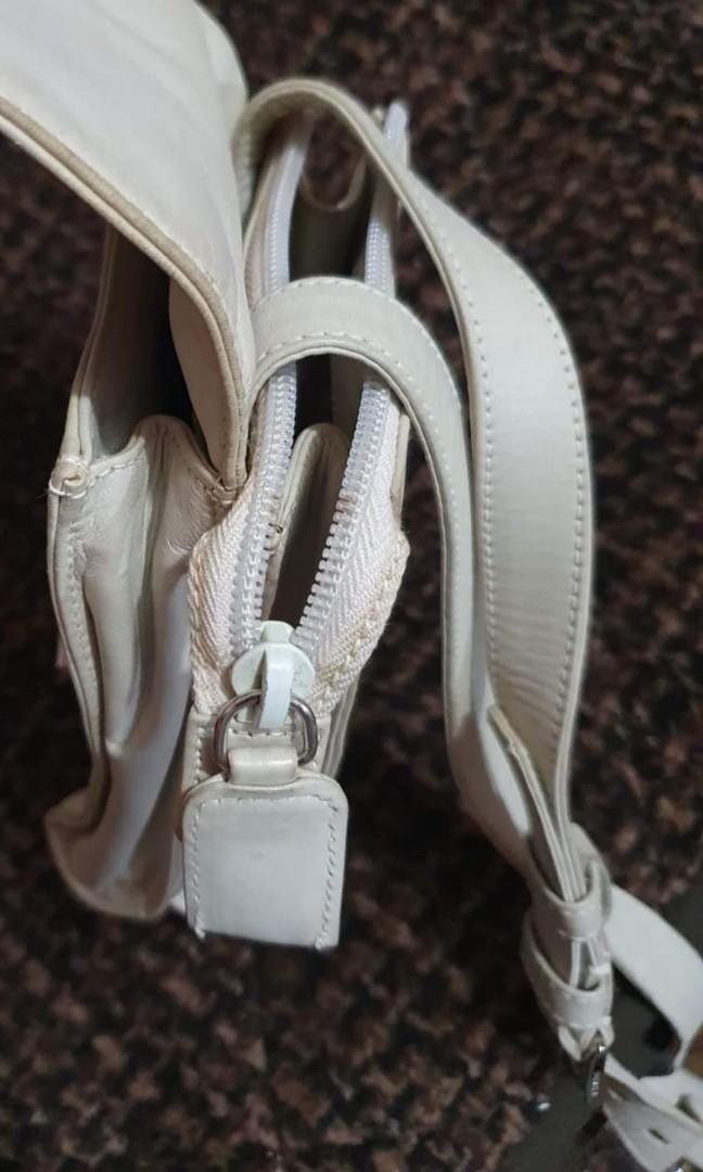 VINTAGE PRADA SLING BAG (Category: Luxury Bags & Wallets) located in Taguig. Submitted by theluxbaghunter (Listing ID 1146623259, Image 3). Description: minimal signs of usage no inclusions vintage orig - wag maghanap ng white number tag.