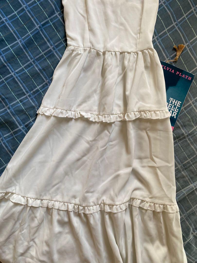 Zahia white ruffle dress (Category: Dresses) located in Quezon City. Submitted by snandyy (Listing ID 1146613699, Image 2). Description: White ruffle dress from Zahia 10/10 condition, rarely worn Dress length: 40 inches Adjustable straps Very folklore by taylor swift vibes ☺️ Message for when worn pics MOP: GCash Shopee checkout available.