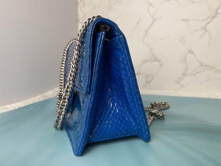 Chanel Mini Python Sling Bag (Category: Bags & Wallets) located in Singapore. Submitted by i1bag (Listing ID 1150019299, Image 2). Description: 💙Chanel Mini Python Sling Bag💙 - Silver Hardware - Blue Python 🏷$4800 🔖Comes with Hologram - Inventory 542 📞+65 8023 4618 🏠62 Ubi Road 1 Oxley Bizhub 2 #01-34 Singapore 408734 🌍Worldwide Shipping Available 💰Reserve with Deposit 💯Authentic Guaranteed I1bag is a Singapore registered preowned luxury
