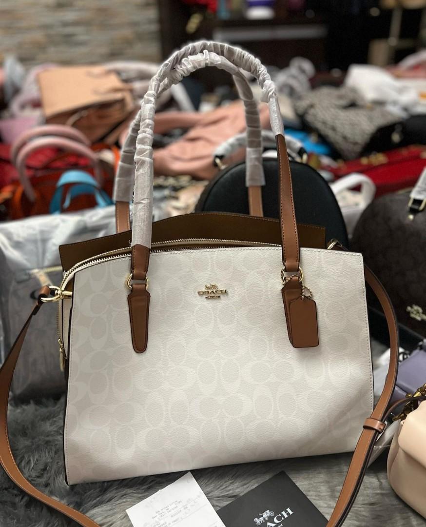 tatum carryall in signature canvas