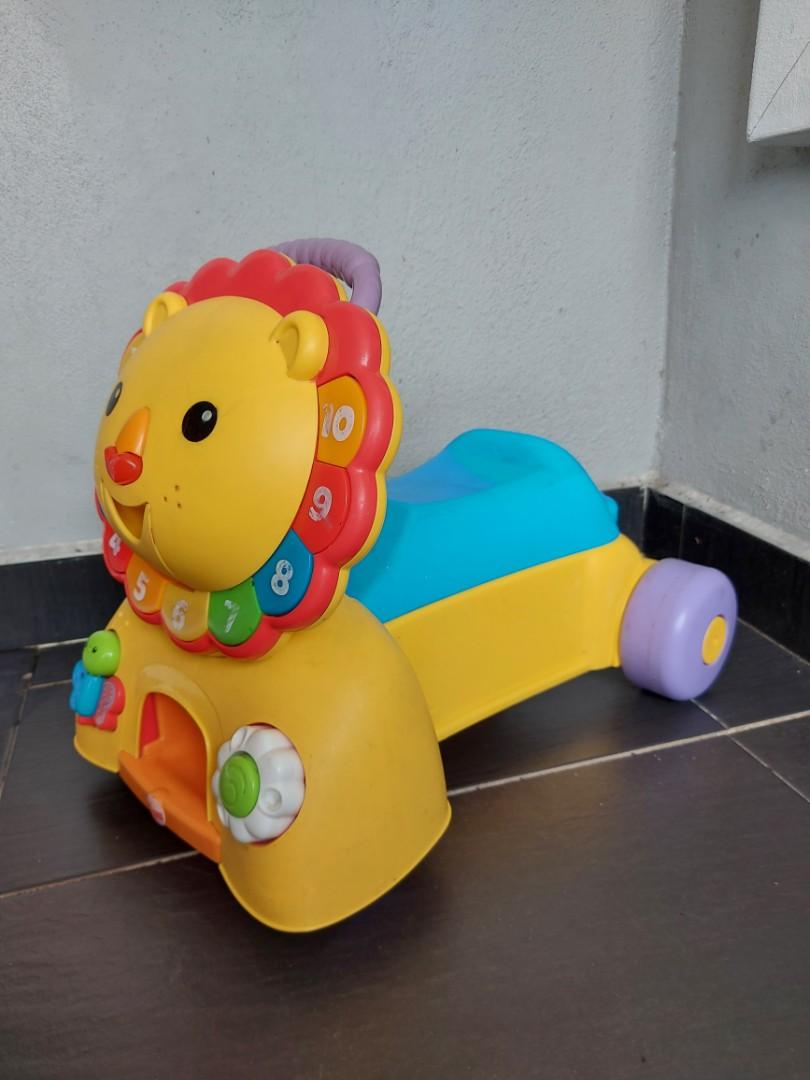 Fisher price sit and online stride lion