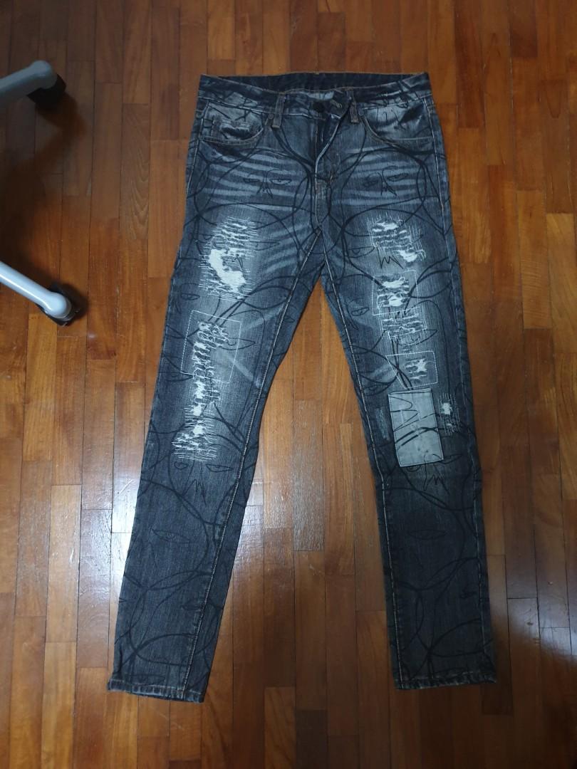 Haculla Black graffiti jeans W32, Men's Fashion, Bottoms, Jeans on Carousell