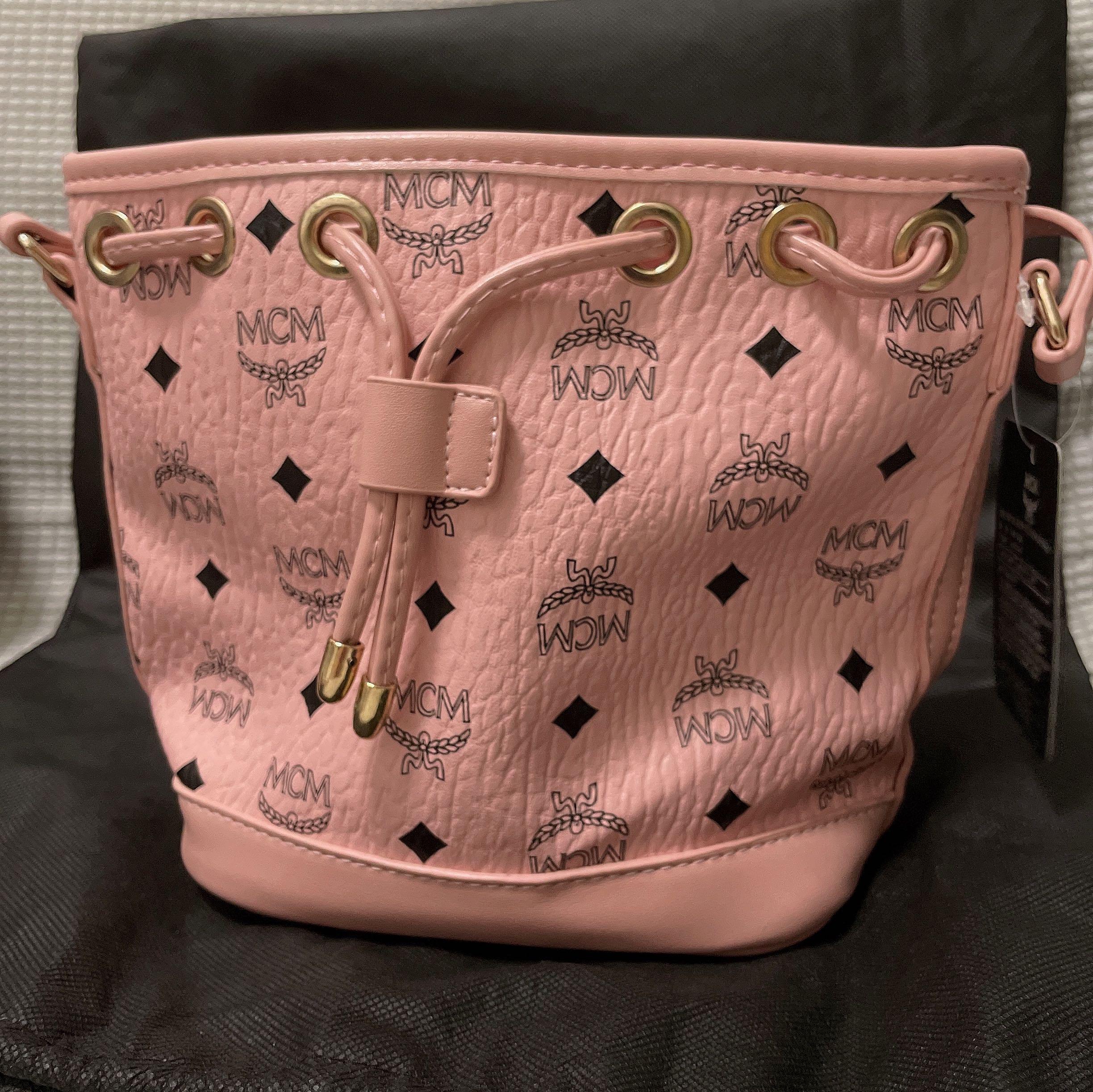 Mcm sling bag pink best sale