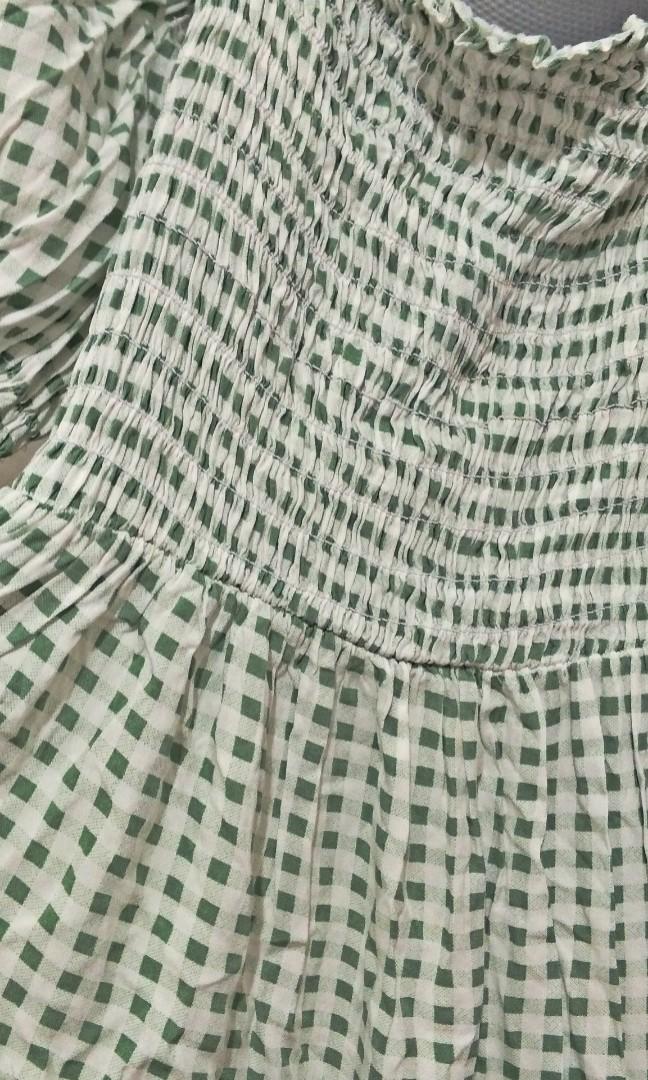 Puff dress (Category: Dresses) located in Taguig. Submitted by avigee (Listing ID 1150175106, Image 2). Description: puff dress/ can be worn off shoulders stretchy / below the knee/ shopee check out 🚨 payment first policy.