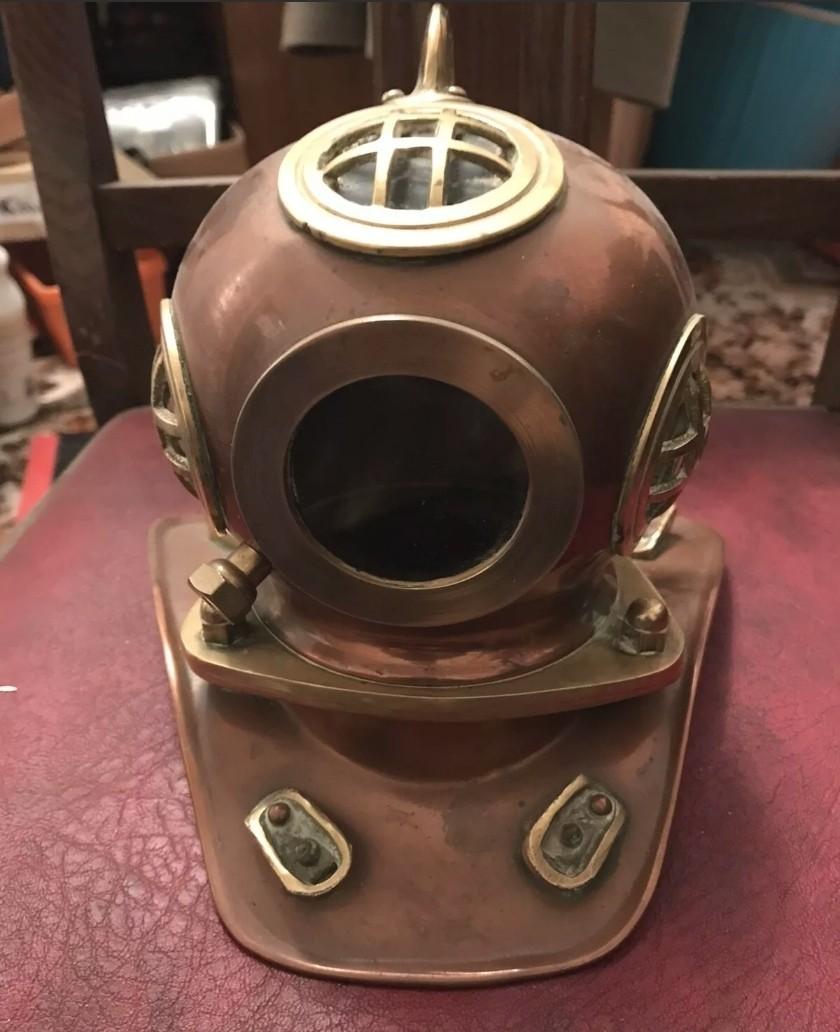 Rolex diving helmet display deals
