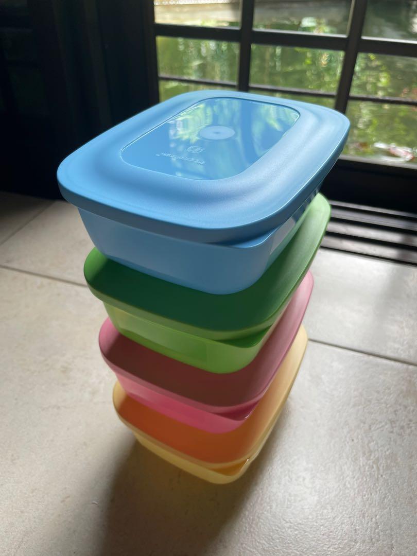 Tupperware Small Rectangular Saver (Category: Food Organisation & Storage) located in Singapore. Submitted by pheepbs (Listing ID 1150073481, Image 2). Description: 1 for $3 4 for $10 Retail: $7 Colors: Yellow, Blue, Pink, Green Description: Stackable n space saver. Sheer base to see content. Tab ease opening Capacity: 500ml Dimension: 16.4cm(L) x 12.4cm(B) x 5.9cm(H) Self collection at Kovan/Bishan Check out my profile for other Tupperware produ
