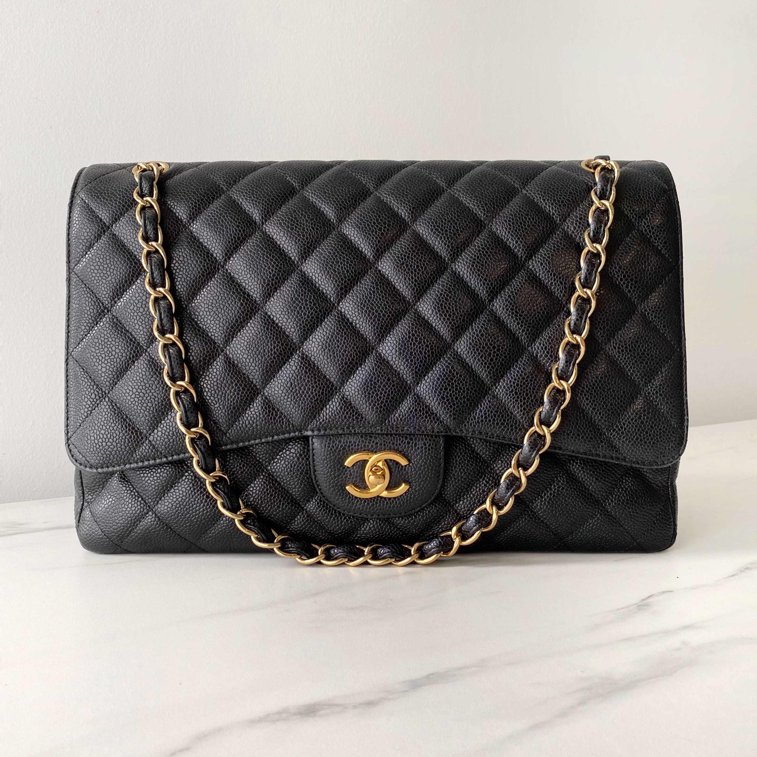 Chanel Black Quilted Caviar Maxi Classic Single Flap Bag, Luxury