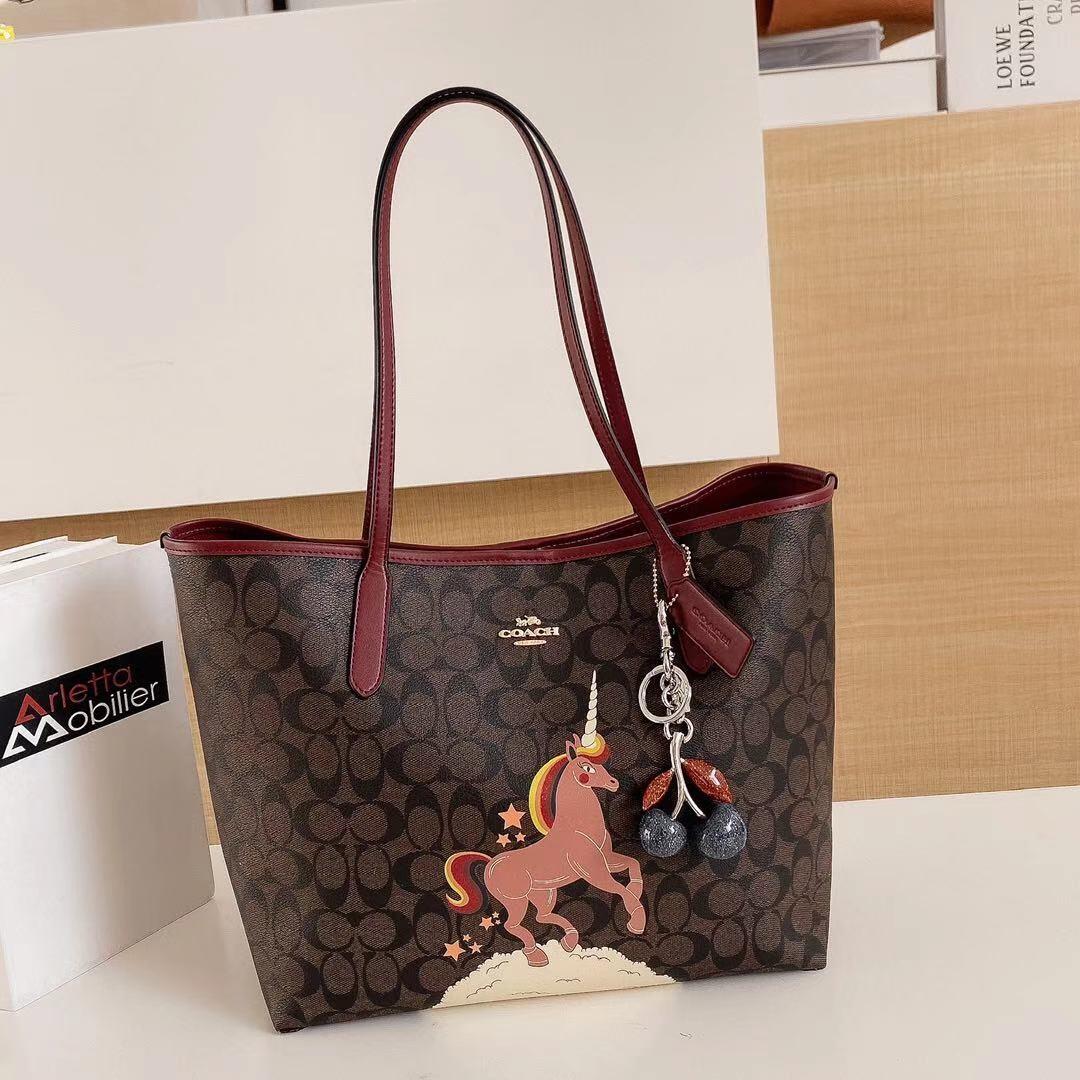 City tote in signature canvas with unicorn sales