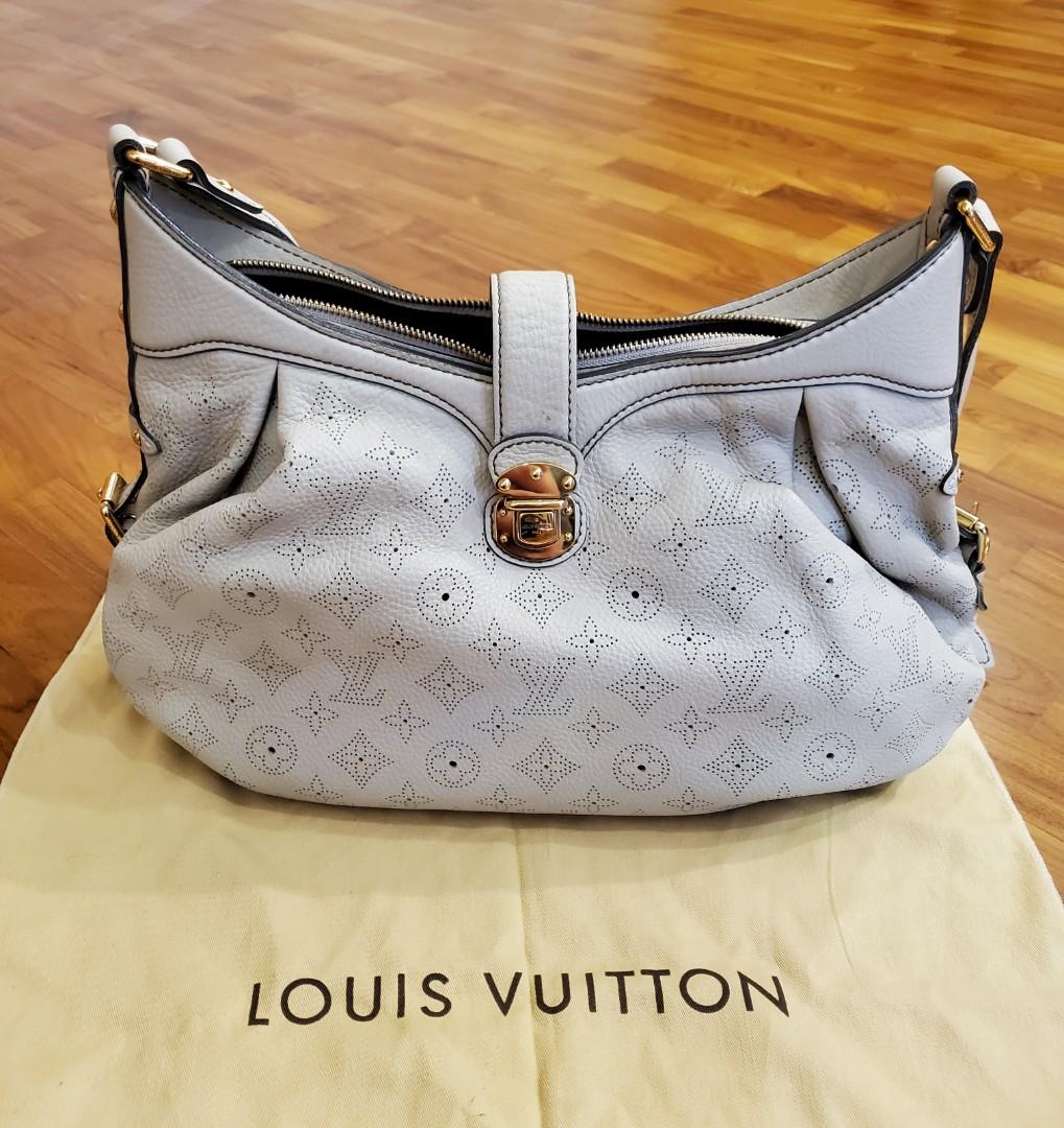 louis vuitton cream color bag