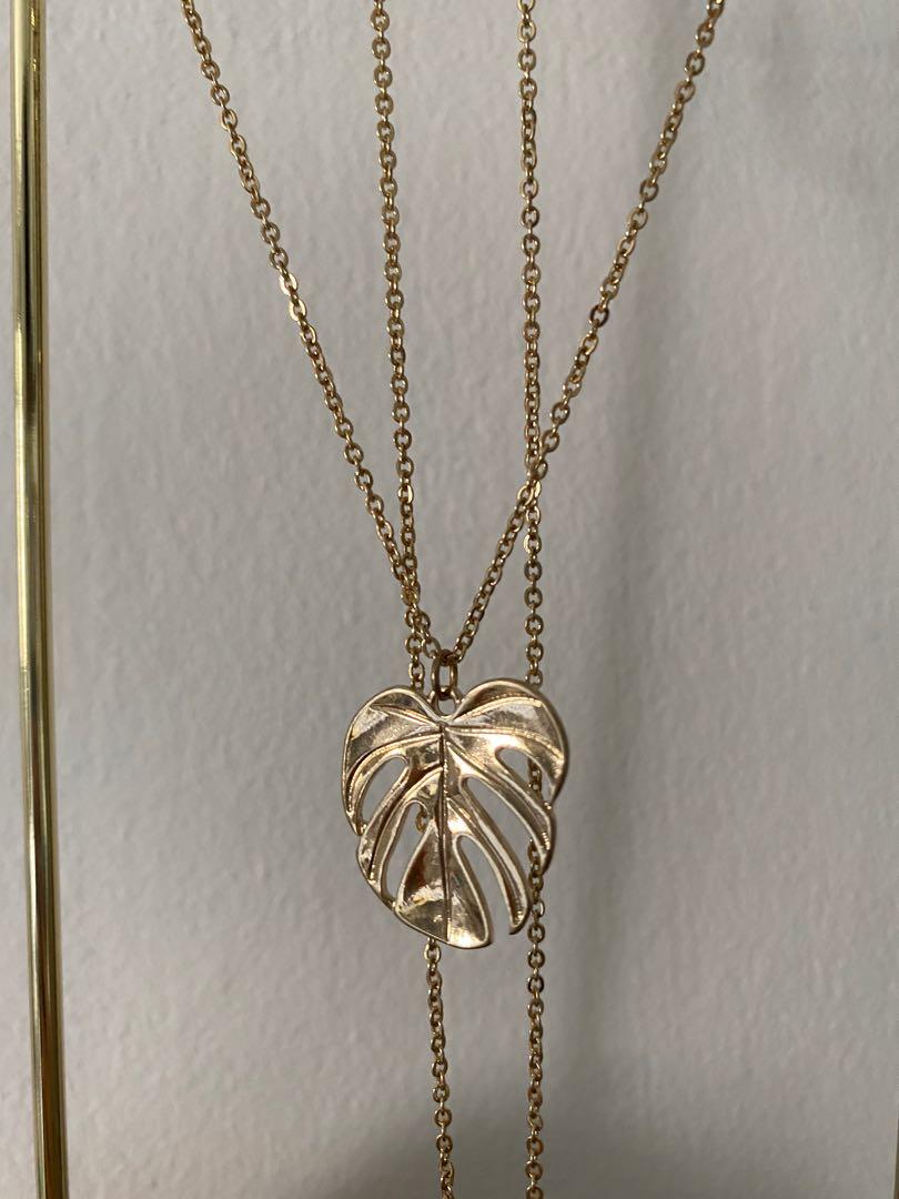 Gold palm leaf necklace hot sale