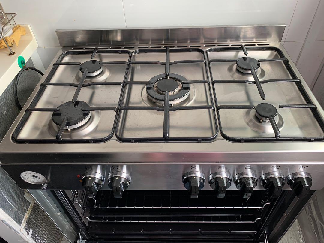 stove with gas burners and electric oven