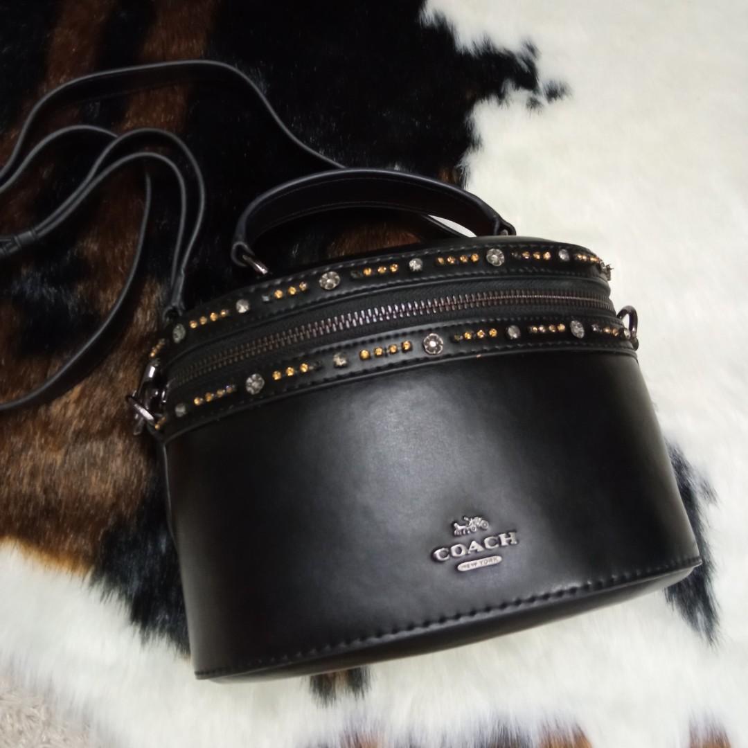 Coach x selena gomez crystal embellished trail bag on sale